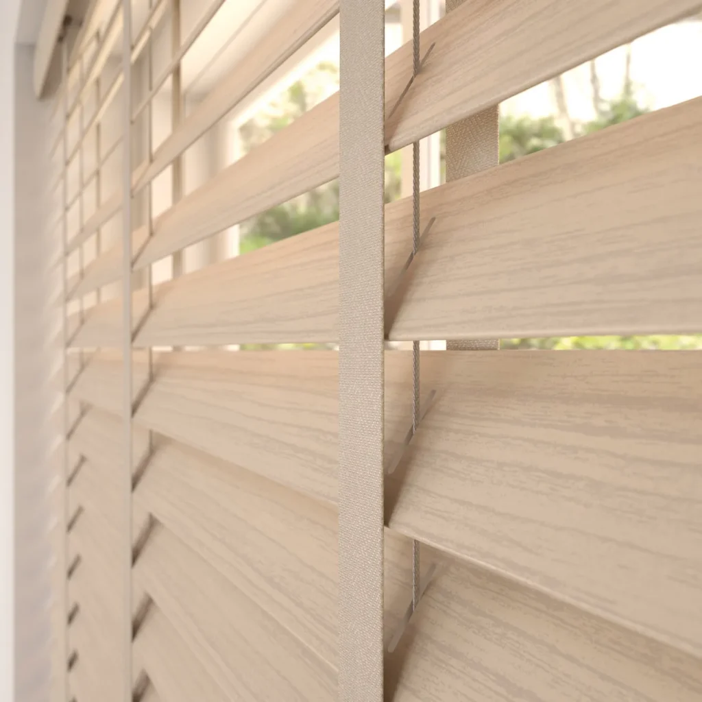 Close-up of pale oak wooden Venetian blind slats with tape trim